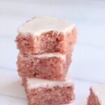 Freshly baked strawberry brownies with silky glaze.