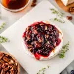 The preparation steps of Cranberry Pecan Baked Brie