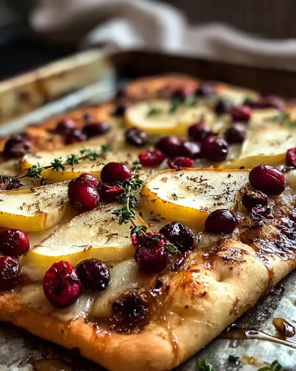The preparation steps of Roasted Pear, Cranberry, and Brie Flatbread